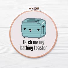 a cross stitch pattern with the words fetch me my bathing toaster