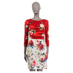 100% authentic Dolce & Gabbana rose print sheath dress in multi-color silk (92%) and elastane (8%) with a round neck. Closes on the back with a concealed zipper. Lined in silk (97%) and elastane (3%). Has been worn and is in excellent condition. Measurements Tag Size 42 Size M Shoulder Width 38cm (14.8in) Bust From 82cm (32in) Waist From 72cm (28.1in) Hips From 90cm (35.1in) Length 92cm (35.9in) Sleeve Length 50cm (19.5in) All our listings include only the listed item unless otherwise specified Silk Roses, White Silk, Rose Print, Dolce & Gabbana, Sheath Dress, Half Sleeves, Evening Gowns, Red And White, Evening Dresses