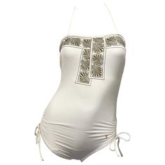 Beautiful and classic early 1980s YVES SAINT LAURENT ivory / off-white and gold seashell print one piece halter swimsuit / bodysuit! Features a flattering ruched waist that hides any 'problem' areas. Ties at each hip with a halter neck that ties at back neck. Metallic gold sea shell print around the top, with the YSL logo embroidered at the left hip. Great for the beach, yacht, or pool. Also great as a bodysuit paired with jeans, shorts or a skirt. In great condition. Made in France Approximatel Gold Halter Top, Fantasy Manhwa, Luxury Swimsuits, Seashell Print, Halter Swimsuit, Orange Swimsuit, Swimsuit Sale, French Fashion Designers, Vintage Swimwear