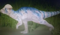 a blue and white dinosaur walking through tall grass