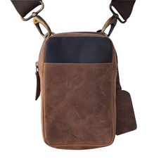 Our Expedition Sling is the hands-free solution for multi-taskers, adventurers and casual errand runners. Lightweight and compact, crafted in hand-stained buffalo leather, the Sling is ready to go when you are. One easy sling over the shoulder and you’re well on your way. There are 4 RFID-lined credit cards slots, making it easy to take what you need, and leave the bulk behind. Slip the back loop through your belt and wear it conveniently as a belt bag. Add a monogram on the hangtag for a person Leather Shoulder Bag With Waxed Finish For Outdoor, Brown Leather Shoulder Bag For Outdoor, Brown Leather Shoulder Bag For Outdoor Activities, Functional Brown Everyday Shoulder Bag, Practical Brown Shoulder Bag With Cell Phone Pocket, Functional Shoulder Bag For Outdoor Activities With Waxed Finish, Functional Waxed Finish Shoulder Bag For Outdoor Activities, Casual Waxed Finish Shoulder Bag For Everyday, Casual Waxed Finish Shoulder Bag For Everyday Carry