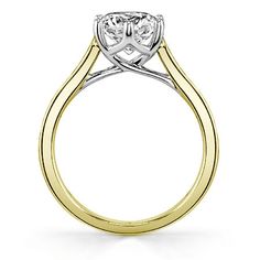 a yellow and white gold engagement ring