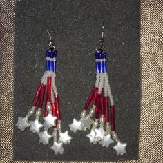 Get Your Fourth On!!! These Whimsical Earrings Are Handmade Of Seed Beads And White Stars. The Length On These Including Ear Wires To The Longest Star Is 3". Handmade Red Beaded Earrings For 4th Of July, Handmade White Earrings For 4th Of July, Patriotic Red Star-shaped Earrings, Red Patriotic Beaded Earrings, White Dangle Earrings For 4th Of July, Adjustable Red Patriotic Earrings, Red Jewelry With Ear Wire For Independence Day, Red Dangle Earrings For 4th Of July, Patriotic Red Star Earrings