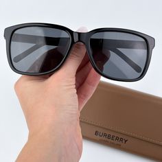 Burberry Be4181 300187 Brand New Sunglasses Black Grey Square Unisex Same/Next Day Shipping! Brand New And 100% Authentic! Made In Italy. Brand: Burberry Model Number: Be4181 / Be 4181 Color Code: 300187 Gender: Men / Unisex Frame Shape: Square Frame Color: Black Frame Material: Plastic Frame Type: Full Rim Lens Color: Dark Grey Lens Material: Plastic Size: 58x17x140 100% Uv Protection! Full Retail Burberry Set Includes: 1. Glasses 2. Case 3. Cleaning Cloth With Brand Logo 4. Certificate Of Auth Burberry Models, New Sunglasses, Burberry Accessories, Square Frame, Color Code, Square Frames, Cleaning Cloth, Black Grey, Black Frame