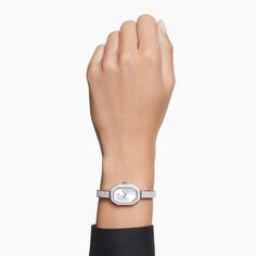 Crafted in the iconic octagon shape of Swarovski, this unique Dextera bangle watch is made for maximum glamour. The stainless steel case is 20mm x 30.5mm and is adorned with a pavé of 92 crystals on the bezel. This provides a perfect frame for the sunray dial, which features a swan logo at 12 o’clock and three crystallized index markers. Along with a single dazzling crystal set in the crown, the watch is also brought to life by 194 crystals set along the adjustable bracelet, providing exceptional beauty at every hour. This Swiss made watch is water resistant to 30m and combines joyful extravagance with signature Swarovski savoir-faire. Article no.: 5672977Collection:  Dextera BangleCase size: 1 1/4 inches x 3/4 inchesWatch strap length: 6 1/4 inchesMaterial:  Crystals, Stainless steelColor Swarovski Watch, Swan Logo, Pink Watch, Swiss Made Watches, Zodiac Bracelet, Bangle Watches, Octagon Shape, Metal Bracelet, Crystal Set