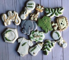 some decorated cookies are laying on a table