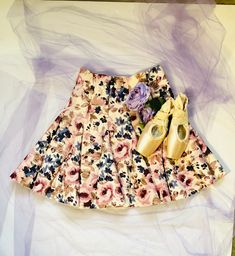 This is a perfect ballerina-of-duty skirt! Above the knee. Back zipper closure. Goes well from day to night, it's all about what you pair it with! Fits a waist from 25 to 30. Contact me if you have any questions and I'll be happy to help! PLEASE BROWSE THE REST OF MY STORE! https://www.etsy.com/shop/BarreEternal If you are an adult ballet dancer, perhaps you would enjoy my YouTube Channel, Loft Ballerina! Check it out below! https://youtu.be/OsWb94y_U-o Also, make sure to check out my online cou Adult Ballet, Ballet Dancer, Tier Skirt, Ballet Dancers, Tiered Skirt, Rose Print, My Youtube Channel, Above The Knee, Boho Shorts