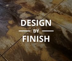 the words design by finish are overlaided with brown and black marbles on a tile floor