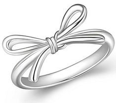 Some of the best things in life are packaged with a bow. Like you, for instance! Slip this sterling silver bow tie ring on your finger and you'll shine like the gift you are. From Silver Style. Elegant Bow Ring For Gifts, White Bow Tie Jewelry As Gift, White Bow Tie Jewelry For Gift, Classic Silver Jewelry With Bow Detail, Classic Silver Jewelry With Bow, Silver Jewelry With Decorative Bow As Gift, Bow Ring Jewelry For Gift, Silver Wedding Ring With Bow Detail, Bow Tie Ring