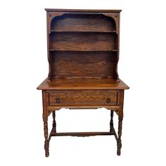 an old wooden desk with a book shelf on it's top and bottom shelves