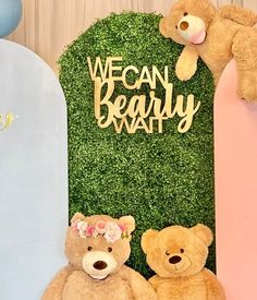 two teddy bears sitting next to each other in front of a sign that says vegan beary watt