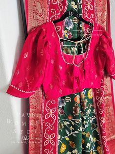 Blouse stitched - Yes Blouse Opening - Back Sleeves Length - Elbow Padded - No Blouse size - 38 with inner margins expandable upto 44 For Blouse Size 36 alteration can be done on request. Fall/pico - Yes done Traditional Long Sleeve Blouse With Kalamkari Print, Transitional Red Kalamkari Print Blouse Piece, Semi-stitched Kalamkari Print Blouse Piece In Katan Silk, Red Bohemian Blouse With Kalamkari Print, Red Kalamkari Print Pre-draped Saree, Organza Blouse, Elbow Pads, Printed Sarees, Saree Blouse