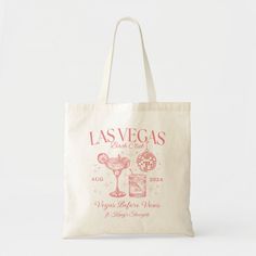 a white bag with las vegas's logo on the front and side, in pink ink