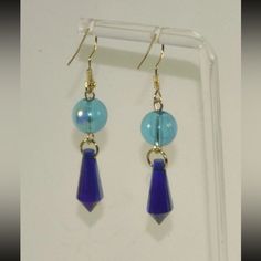 This Unique Pair Is A Wonderful Addition To Your Wardrobe And Your Style; Sure To Get Lots Of Compliments! Gsunuj50t000ua2 Blue Dangling Beads Earrings For Party, Blue Adjustable Beaded Earrings For Pierced Ears, Adjustable Blue Beaded Earrings For Pierced Ears, Blue Czech Glass Earrings For Party, Adjustable Blue Beaded Earrings Made Of Czech Glass, Blue Metal Earrings With Dangling Beads, Blue Czech Glass Beaded Earrings For Pierced Ears, Blue Teardrop Beaded Earrings With Czech Glass, Blue Cadmium-free Drop Earrings