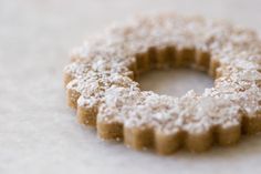 a cookie with powdered sugar on top