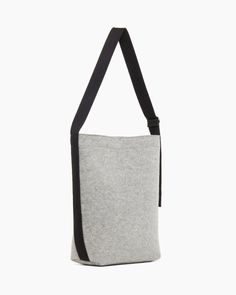 Say hello to your new everyday bag. Dressier than a basic tote, but more casual than a handbag, it delivers an elevated option for a work or day bag. Made with Merino wool felt (lighter, sturdier and more sustainable than leather) and a cotton webbing strap, it's adjustable to give the bag multi-purpose as a crossbody, handbag or shoulder bag.A large opening makes it easy to get things in and out on the go. A bag you can feel good about wearing. Wool Tote, Notebook Bag, Felt Tote, Fog Linen, Granite Colors, Needlepoint Kits, Day Bag, Vintage Clock, Everyday Bag