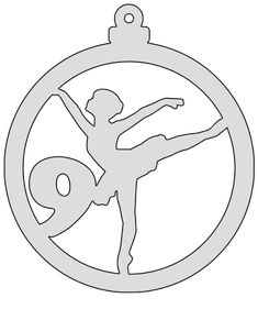 an ornament with a silhouette of a ballerina