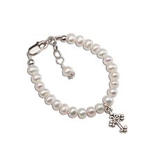 "From our \"Timeless Collection\" this keepsake freshwater pearl bracelet is perfect for baptisms, christenings, dedications or first communion gift.  This sweet bracelet is accented in the center with a sterling silver cross and a drop pearl accent.  This piece is designed with rhodium-plated components to prevent tarnish. This is a high-quality bracelet made to be a keepsake she can treasure....hand-beaded in the USA!    Perfect religious gift!  This bracelet comes in our Timeless Collection gift box!   FREE SHIPPING ON STANDARD ORDERS - Ships within 1 business day! Each bracelet has a grow-with-me extension chain for a perfect fit.  Please see sizing chart below: SM (0-12 months) 4 - 4.5 inches MED (1-5 years) 5 - 5.5 inches LG (6-12 years) 6 - 6.5 inches Matching Necklace: https://etsy First Communion Pearl Drop Jewelry, Adjustable Pearl Bracelet For First Communion, Pearl Charm Jewelry For First Communion, Elegant Pearl Rosary Bracelet For Baptism, Classic Adjustable Jewelry For First Communion, Elegant Adjustable Pearl Bracelet For Baptism, Elegant Silver Pearl Bracelet For Baptism, Pearl Charm Bracelet For First Communion, Adjustable Pearl Bracelet With Charm For First Communion