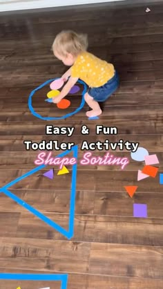 a toddler playing with an easy and fun activity for toddlers to play on the floor