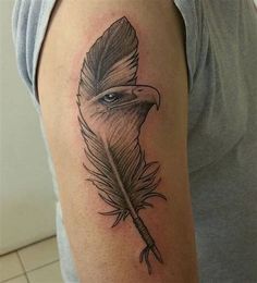 a woman's arm with a feather and an eye tattoo on the left arm