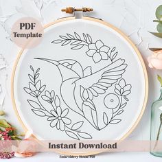 an embroidery pattern is shown with flowers and birds in the hoop, along with text that reads instant download