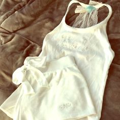 White Betsey Johnson Bride Tank And Shorts Pajama Set With Rhinestone And Lace Detail. Once Worn Once. Tank Top Size Small, Shorts Size Medium. Perfect Condition White Matching Set Tops For Loungewear, White Fitted Set For Pajama Party, White Matching Set Tops For Pajama Party, Fitted Lace Trim Loungewear Set, White Sets With Lace Trim For Pajama Party, White Stretch Tops For Bedtime, Fitted Cotton Pajama Shorts For Bedtime, White Fitted Sleepwear For Wedding Night, Cotton Wedding Sets With Lace Trim