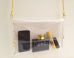 Deluxe Clear Clutch with chain, Deluxe Transparent Clear Purse,Deluxe Transparent Clear Bag,Clutch ,Bag,Purse(Big Size) on Etsy, $30.90 Trendy Gold Shoulder Bag With Clear Strap, Chic Clear Bags Perfect As Gifts, Chic Clear Bags For Gifts, Chic Clear Bags As Gifts, Trendy Clear Shoulder Bag For Gifts, Trendy Clear Shoulder Bag As Gift, Clear Clutch Bag As Gift, Gold Crossbody Shoulder Bag With Clear Strap, Clear Rectangular Shoulder Bag For Gift