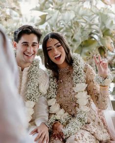 a man and woman sitting next to each other