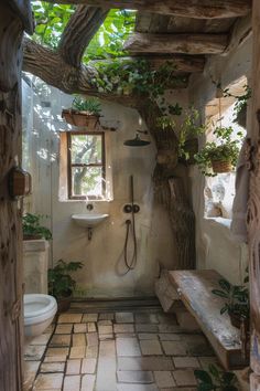 a bathroom with a tree growing on the wall