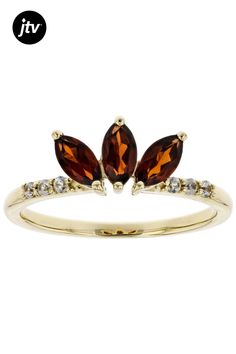 Pre-Owned .76ctw marquise Vermelho Garnet(TM) and .10ctw round white zircon, 10k Yellow Gold 3-Stone Ring. Measures approximately .67"L x .28"W..  This product may be a customer return, vendor sample, or on-air display and is not in its originally manufactured condition.  It may not be new.  In some instances, these items are repackaged by JTV. Accent stones primarily zircon. 3 Stone Rings, Yellow Gold Ring, Red Garnet, 10k Gold, Yellow Gold Rings, Stone Rings, Gold Ring, Garnet, Gold Rings