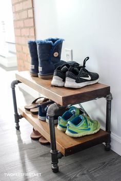 several pairs of shoes are sitting on a shelf