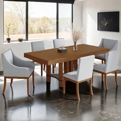 a dining room table with six chairs and a vase on the end, in front of a large window