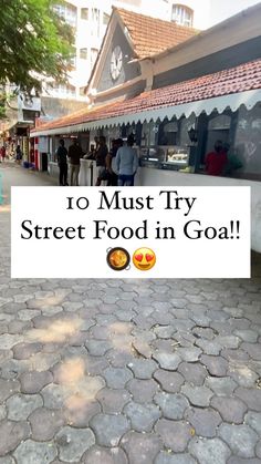 a sign that says no must try street food in goal with an image of people walking on the sidewalk