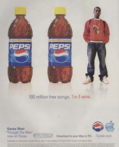 a man standing next to two bottles of pepsi