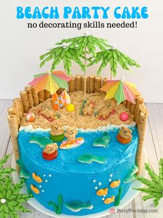 there is a cake that has been decorated like a beach party