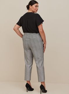 FIT Model is 5'10” wearing size 12. High rise. . Eased through the hip and thigh with a tapered leg. Pull-on elastic waist. Tapered leg hits just above the ankle. . Inseam: 27”. MATERIALS + CARE Studio Luxe Ponte knit fabric: Our signature work (any) wear fabric with office-approved tailoring, WFH stretch and comfort, and curve-loving hold. Plus, it’s machine washable! Stretch level: Maximum. Wrinkle resistant. 68% rayon, 28% nylon, 4% spandex. Machine wash cold. Line dry. Imported. DETAILS Pull Relaxed Fit Tapered Bottoms With Belt Loops, Fitted Tapered Bottoms For Workwear, Fitted Tapered Workwear Pants, Tapered Bottoms With Elastic Waistband For Workwear, Tapered Elastic Waistband Bottoms For Workwear, Relaxed Fit Tapered Bottoms For Business Casual, Business Casual Tapered Bottoms With Relaxed Fit, Business Casual Bottoms With Relaxed Tapered Fit, Fitted Tapered Leg Bottoms With Elastic Waistband