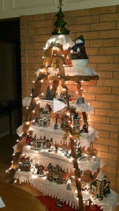 a christmas tree made out of wood and lights