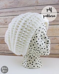 a white knitted hat with black polka dots on the brim and text overlay that says, puff pattern