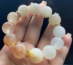 Material:Rabbit hair crystal quartz beads  size :  Approx 17mm quantity: one strand 6mm approx 29 pcs one strands 7mm approx25 pcs one strands 8mm approx 22 pcs one strands 9mm approx 21pcs one strands 10mm approx 19 pcs one strands 11mm approx 18pcs one strands 12mm approx 16 pcs one strands 13mm approx 16 pcs one strands 14mm approx 15 pcs one strands 15mm approx 14pcs one strands 16mm approx 14 pcs one strands 17mm approx 13pcs one strands 18mm approx 13pcs one strands 19mm approx 12pcs one s Chinese Jade, Quartz Beads, Healing Bracelets, Rutilated Quartz, Beads Bracelet, Colour Tone, Natural Crystals, Beaded Bracelet, Quartz Crystal