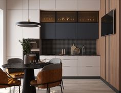 a black table and some chairs in a room with white walls, cabinets and counters