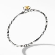 From David Yurman, the Chatelaine(R) Collection is a perfect fusion of David and Sybil Yurman's combined art-the marriage of a sculptor and a painter-form and color. Sterling silver with 18-karat yellow gold 18K gold dome, 8mm Bracelet, 3mm Hook clasp Size Large: Fits a wrist measuring 6.5-7 inches in circumference Style Number: B12609 S8AGGL Designers Jewelry Collection, David Yurman Bracelet, Designer Bracelets, Small Bracelets, Modern Watches, Chatelaine, Hook Clasp, Bracelets For Women, Watches Jewelry