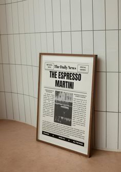 a newspaper advertises the espresso martini in front of a tiled wall