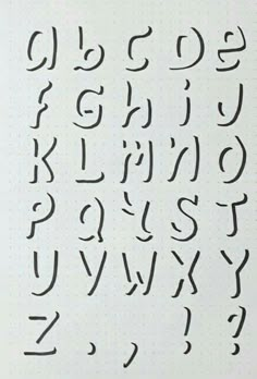 the letters and numbers are drawn in black ink on a sheet of paper with dots