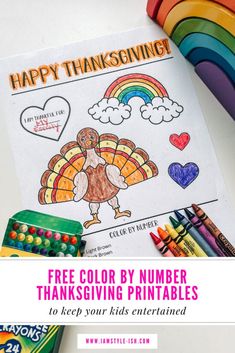 a coloring page with the words happy thanksgiving on it and colorful crayons next to it