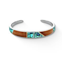 18K Yellow Gold and Sterling Silver Cuff Bracelet with Abalone and Koa Wood Inlay. The inner circumference of the cuff bracelet measures approximately 6.50". Inlay Jewelry, Koa Wood, Dapper Gentleman, Wood Inlay, Leaf Ring, Sterling Silver Cuff Bracelet, Iconic Design, Fine Jewels, Sterling Silver Cuff