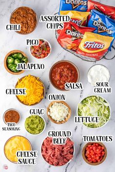 the ingredients to make taco salad in bowls on a marble counter top with text overlay