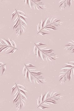 a pink wallpaper with white leaves on it