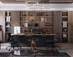 an office with black leather chairs and wooden shelves on either side of the desk is a large open bookcase