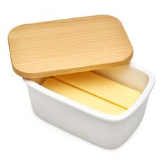 an empty container with cheese sticks in it