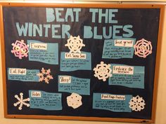 a bulletin board that has been decorated with different types of snowflakes on it